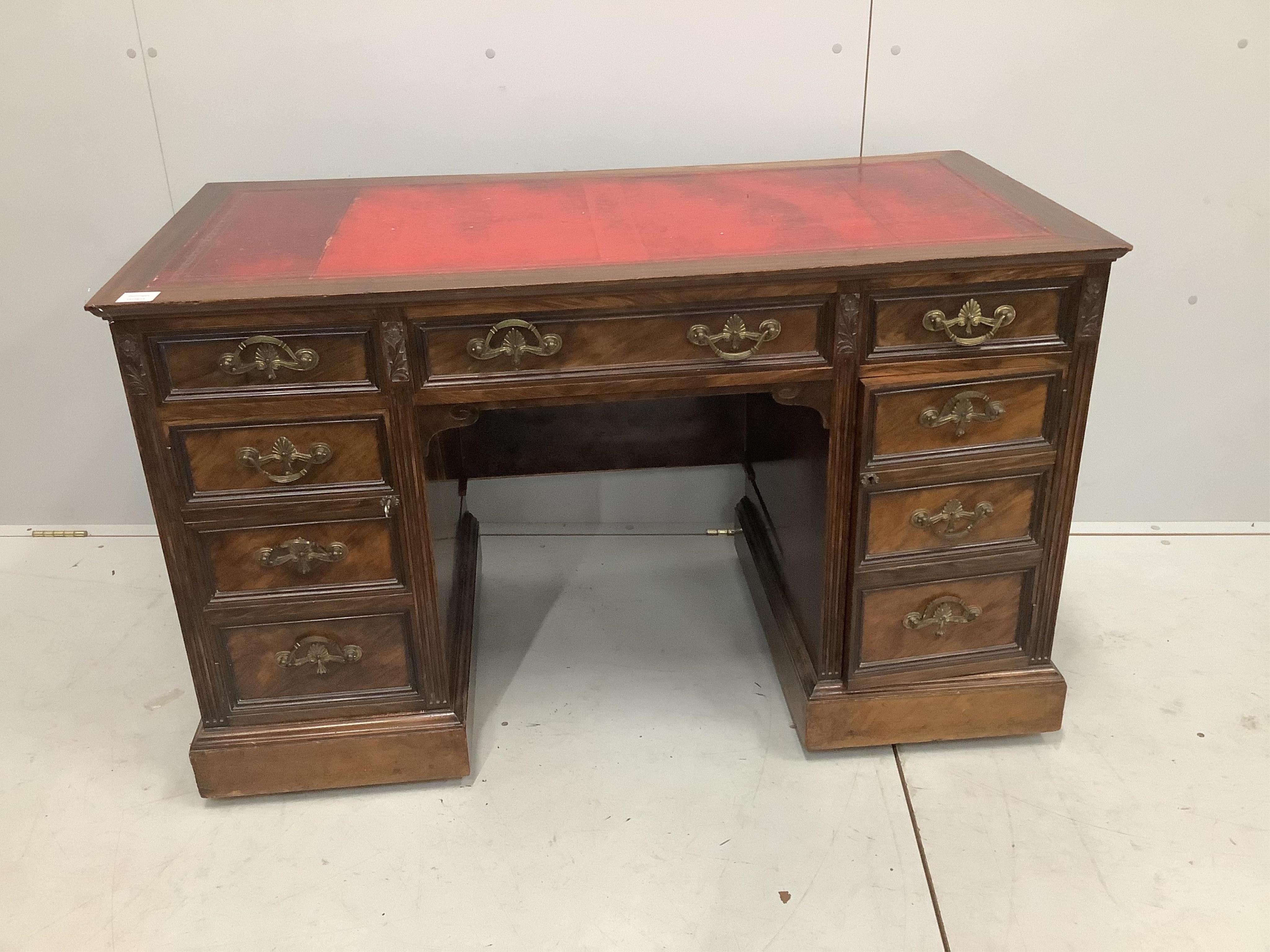 A late Victorian mahogany kneehole desk, width 120cm, depth 59cm, height 74cm. Condition - fair